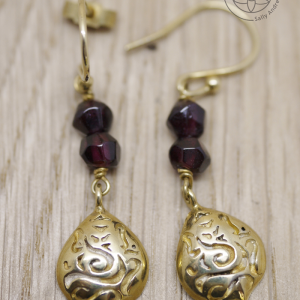 Small Ganesh drop earrings with faceted garnet beads