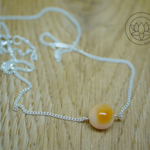 Carnelian single gemstone delicate necklace on a diamond curb chain.